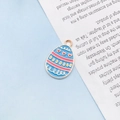 Pastel blue and pink enamel Easter egg charm with gold accents for DIY jewelry making - Red Heart Egg