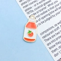 Cute enamel strawberry drink pendant charm in golden finish for DIY jewelry crafts - Red Strawberry Milk (14970)