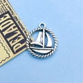 Vintage silver sailboat charm with rope frame for DIY jewelry making and craft projects - 16x18mm / Sailboat Style (7336)