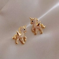 Elegant gold-plated unicorn stud earrings with sparkling cubic zirconia on silk background - Unicorn Pegasus / Gold
