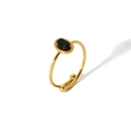 Close-up of 18K gold-plated adjustable ring with oval black stone and vintage texture - Black Style (TR4020-BK)