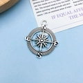 Antique silver compass pendant with N S E W directional letters and central star - Antique Silver Navigation Compass