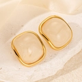 Orecchini vintage in acciaio al titanio con inserto in resina effetto marmo crema - Bianco avorio
