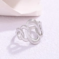 Detailed view of elegant silver shell ring with intertwined chain link and polished finish - Chain Link Style (4060) / Silver