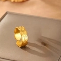 Macro shot of gold geometric hollow pattern ring with vintage interlaced texture - Geometric Hollow Style (40382) / Gold