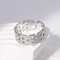 Close-up of silver titanium steel open ring with textured geometric brick pattern - Woven Texture Style (40346-2)