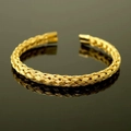 Vintage golden braided stainless steel open bangle bracelet with woven texture details - Braided Steel Bangle Gold