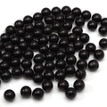 Polished black 10mm round wooden beads for DIY handmade jewelry and bracelets - Ebony