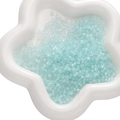 Translucent light blue glass seed beads for DIY jewelry and beaded crafts in a white dish - 450g Pack (2x4mm, Approx. 6700 Pieces) / Light Blue
