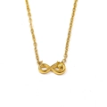 Nahaufnahme des Unendlichkeits-Anhängers mit gelbem Herzstein an Goldkette - Gold Gelber Edelstein