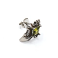 Close-up of vintage silver cross earring with square green zircon and butterfly back - Steel Color Olive Green Zircon