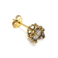 Detailed macro view of vintage gold crown stud earring with clear faceted zircon stone - Gold White Zirconia