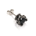 Detailed close-up of a faceted black round gemstone earring with retro silver metal setting - Steel Color Black Zircon