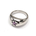 Macro detail of silver titanium steel ring with purple star-shaped gemstone inlay - Steel Purple Zirconia