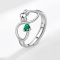 Infinity spinner ring in silver with adjustable band and a pear-cut green gemstone - Adjustable / May (Green)