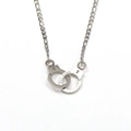 Detail of silver handcuffs pendant with PUT DOWN and LOCK engravings on Figaro chain - Steel
