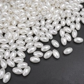Loose oval ABS faux pearl beads in ivory white for DIY jewelry and handmade bracelets - Oval Style (02) / 100 Pieces/Pack (6x10mm) / White