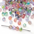 Perles en verre Aurora facettées avec effet iridescent pour la création de bijoux - Mélange Aléatoire