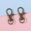 Coppia di moschettoni girevoli in bronzo antico con anello a D per portachiavi fai-da-te - Bronzo Antico