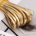 Shiny gold PU leather binding strip in a flat bundle for DIY craft projects - 0.5cm Wide (5m/Pack) / Gold