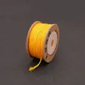 Roll of bright yellow hand-twisted cotton cord for DIY jewelry making and bead stringing - Gold Yellow