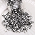 Silver hexagonal glass bugle beads for DIY jewelry making poured on a white plate - Hexagonal Bugle Beads (#05)