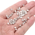 Silver striped alloy loose beads for DIY bracelets shown held in palm for size - Vertical Line Rhombus 4x5mm (Aperture 1mm) / Silver (Approx. 25 Pieces/Pack)
