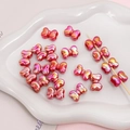 Red and yellow gradient acrylic bow beads with metallic finish for DIY jewelry - 2 Pieces/Pack (15×11mm) / Red