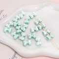 Iridescent light mint green acrylic bow beads for DIY jewelry making and bracelets - 2 Pieces/Pack (15×11mm) / Mint Green