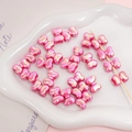 Pink pearlescent bow beads with a smooth finish for DIY jewelry and bracelet making - 2 Pieces/Pack (15×11mm) / Rose Pink