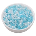 Blue and white mixed glass beads in a ceramic bowl for DIY jewelry and bracelets - Sky Blue