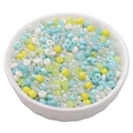 Colorful mixed seed beads and glass tubes in a white ceramic bowl for DIY jewelry making - Sparkling Blue