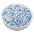 Mix of blue and white glass seed beads for DIY jewelry making in a white ceramic bowl - Quiet Blue