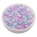 Mixed purple and blue glass seed beads and bugle beads set in a white bowl - Starry Sea Blue