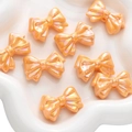 Lustrous peach-pink bow beads with AB iridescent coating for DIY jewelry making - Stackable Design / Pack of 2 (29x22mm) / Orange Red