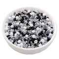 Mixed black white and silver glass seed beads in a white bowl for DIY jewelry making - Snowy Night Silver