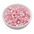 Pink pearl-finished lily of the valley beads with gold loop in a white ceramic bowl - Lily of the Valley 8mm Pink