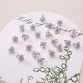 Bulk lavender resin lily of the valley flower pendants with golden pearl center and metal ring - Lily Of The Valley (BSB135) / 5 Pieces / Blue