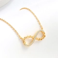 Goldene Unendlichkeit Kette mit funkelnden Kristallen und gewebtem Hohlraum Design - 925er Silber / 18K-Gold