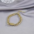 Macro shot of gold Cuban chain necklace with a blank rectangular ID plate on grey silk - 15.5cm+4cm Extension Chain / Gold Bracelet