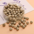 Natural round wooden spacer beads with visible wood grain for DIY jewelry making - Camphor Wood