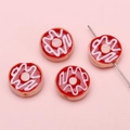 Makroaufnahme von handgefertigten Donut-Perlen für Schmuck mit rosa Wellenmustern - 15mm (1 Stück/Packung) / Rot