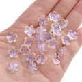 Iridescent 5-petal cherry blossom beads for jewelry making shown on hand - 11mm (1mm Hole, 10 Pcs/Pack) / Imported Rainbow Color