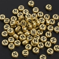 Flat round gold acrylic letter N beads for DIY handmade jewelry necklace crafting - 4x7mm Hole approx 1mm Gold with Black Letter (50 Pieces/Pack) / Letter N