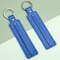 Minimalist navy blue leather keychain with silver metal ring and fine blue stitching - Sapphire Blue