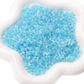Perles de rocaille en verre œil de chat bleu ciel avec fini iridescent pour bijoux DIY - Bleu ciel