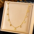 Detail of gold-plated chain featuring evil eye charm and sparkling crystal pendant - Evil Eye Style (N3058)