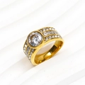 Macro detail of gold vintage band ring featuring a large zircon and pavé setting - Gold White