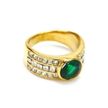 Detailed macro shot of vintage gold ring with emerald green stone and zircon inlay - US 6 / Gold Green