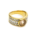 Macro view of wide gold-plated ring with champagne center stone and pavé zircon - Gold Champagne Gemstone
